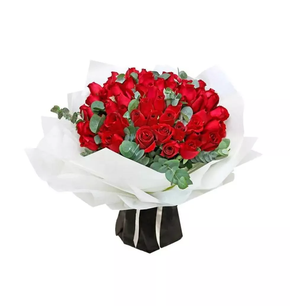 99 red roses in a beautiful bouquet.